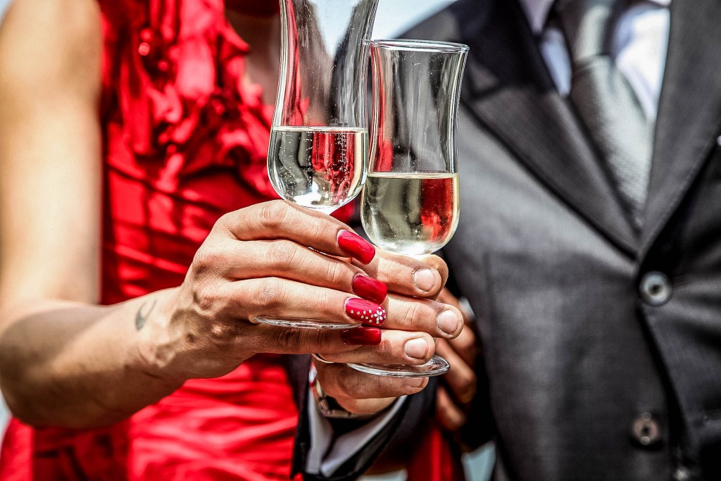 A red gown and a well designed suit are must be in your cruise suitcase