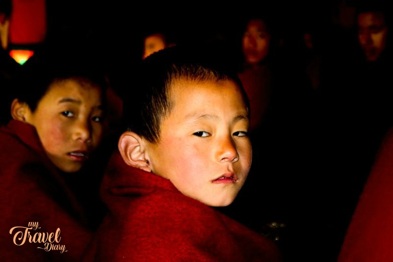 Little monks during the morning prayer session at Tawang Monastery, Arunachal Pradesh. Attending the morning prayer session is undoubtedly one of the Offbeat experiences in Tawang, Arunachal Pradesh