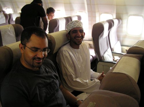 Ali and Saif on the plane from Kuala Lumpur to Muscat, 15-Oct-04