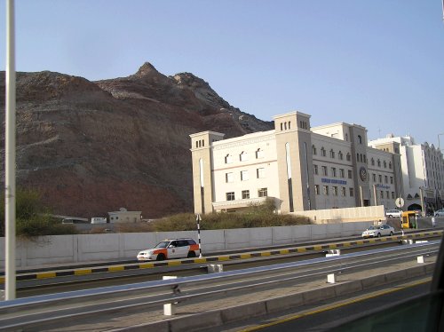 Scene driving along the main highway which runs from one end of Muscat to the other.  Notice the complete lack of topsoil or vegetation on the surrounding mountains.