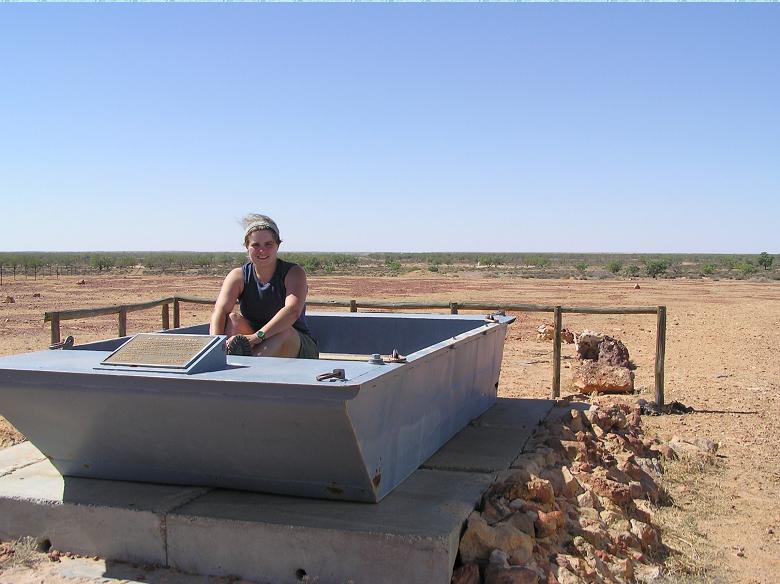 Katie sitting in the Brennan above the dry Cooper Creek bed, Birdsville Track, SA.JPG