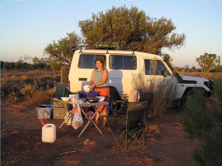 Katie doing the dishes at dawn whilst sleepy old Bradley sleeps!